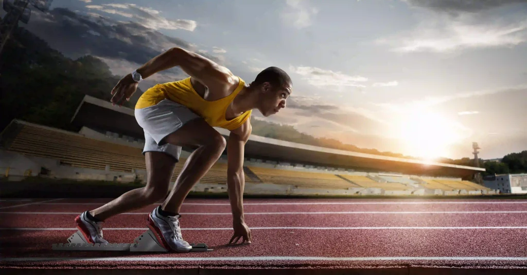 While SEO typically shows results within 3 to 6 months, starting early is essential for maintaining a competitive edge. Male runner just about to start on a 400 meters running track.